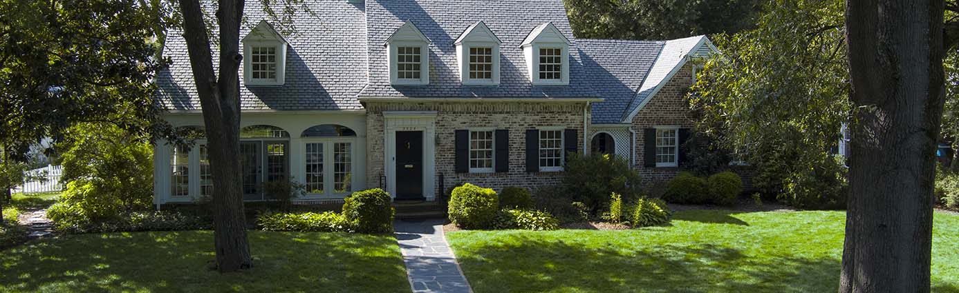 Home with a shaded lawn