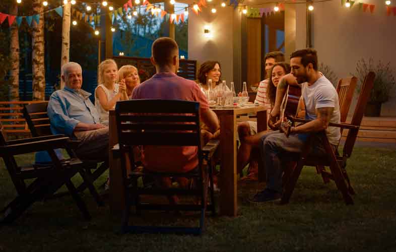 friends enjoying dinner outside