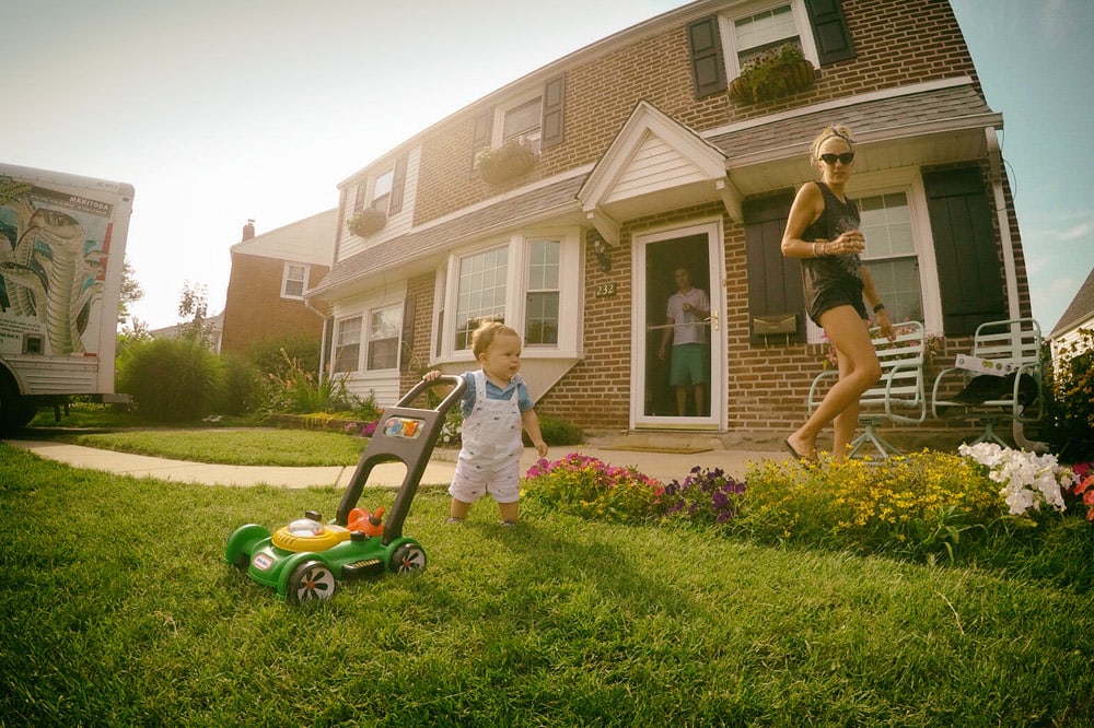 <p>Family enjoys a TruGreen lawn at their new home</p>