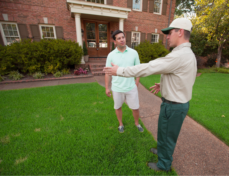 lawn tech with home owner