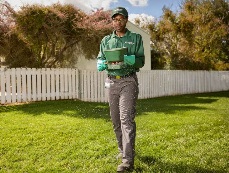 TruGreen specialist on a lawn