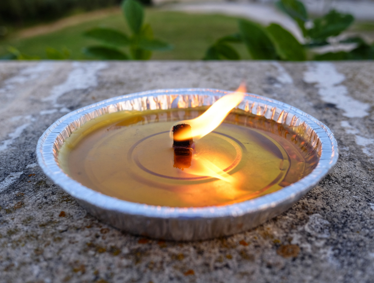 Burning citronella candle
