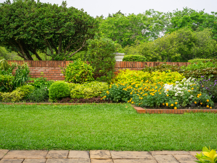 Lovely spring lawn with landscaping surrounding it