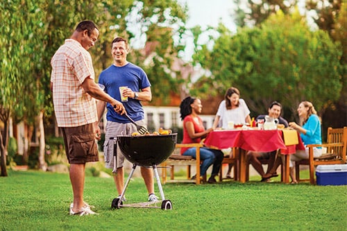 <p>A summer bbq on a healthy TruGreen lawn</p>