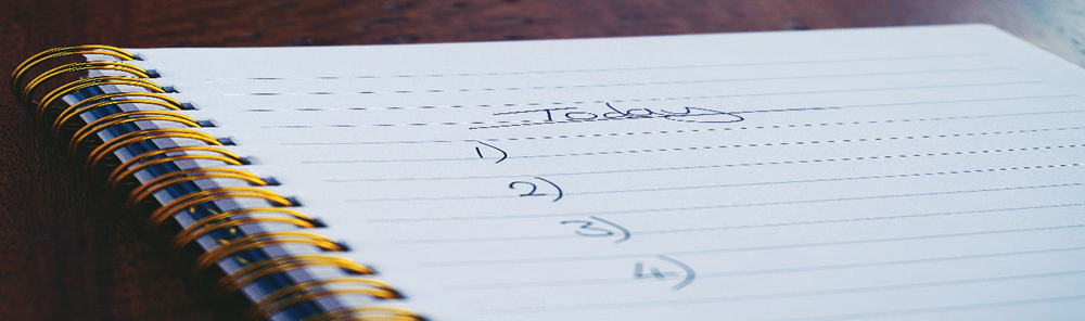 Pad of paper with a checklist