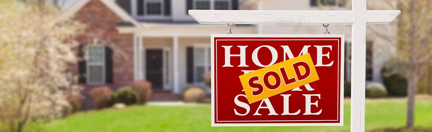 Home "For Sale Sold" sign
